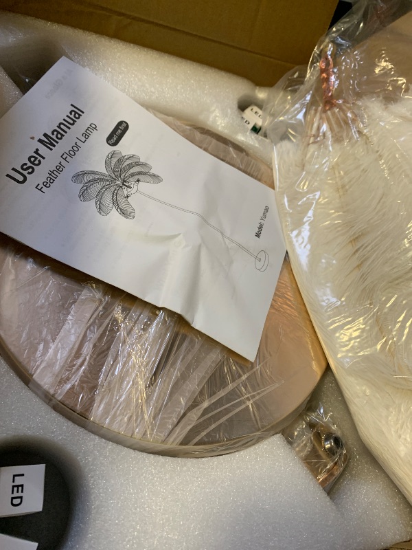 Photo 1 of Fivemengo Feather Floor Lamp for Living Room, Fluffy Ostrich Feathers Lamp, Rose Gold Color Body, 3 Color Temperatures Modern Funky Arc Tall Standing Lamp for Bedroom Inclued Bright LED Bulbs (White)