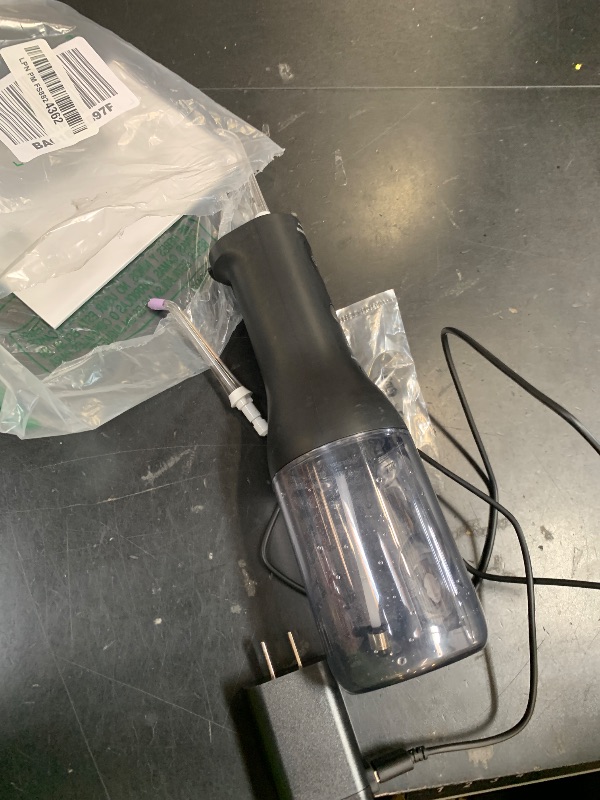 Photo 1 of Philips Sonicare Cordless Power Flosser 3000 - Water Flosser with Innovative Quad Stream Technology, Oral Irrigator with 2 Flossing Modes and 3 Pressure Levels, IPX7 Waterproof, Black, HX3826/23