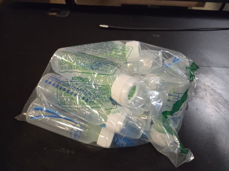 Photo 1 of ten (10) plastic baby bottles