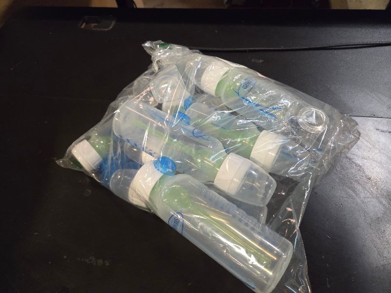 Photo 1 of ten (10) plastic baby bottles