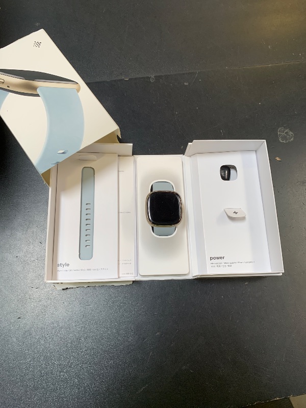 Photo 1 of Fitbit Sense 2 Advanced Health and Fitness Smartwatch with Tools to Manage Stress and Sleep, ECG App, SpO2, 24/7 Heart Rate and GPS, Blue Mist/Pale Gold, One Size (S & L Bands Included)