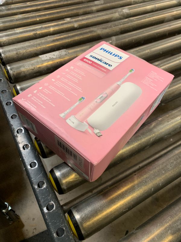 Photo 1 of Philips Sonicare ProtectiveClean 6500 Rechargeable Electric Toothbrush, with Pressure Sensor, 3 Cleaning Modes, SmarTimer and QuadPacer, 14-Day Battery Life, Charging Travel Case, Pink, HX6462/06