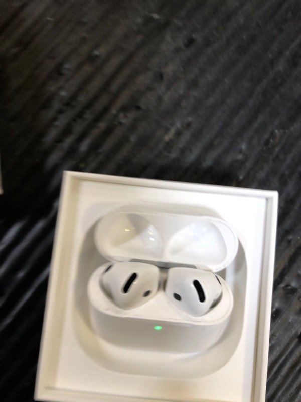 Photo 1 of Apple AirPods 4 Wireless Earbuds, Bluetooth Headphones, with Active Noise Cancellation, Adaptive, Transparency Mode, Personalized Spatial Audio, USB-C Charging Case, Wireless Charging, H2 Chip