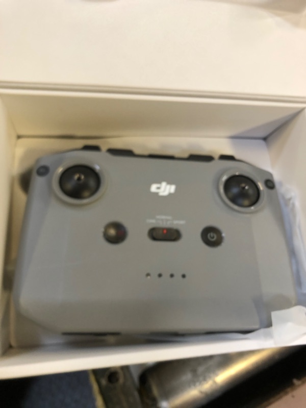 Photo 1 of DJI Mini 3 - Lightweight and Foldable Mini Camera Drone with 4K HDR Video, 38-min Flight Time, True Vertical Shooting, and Intelligent Features controller only 