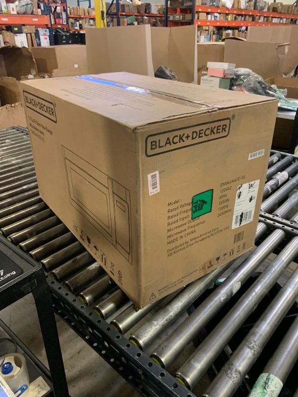 Photo 1 of BLACK+DECKER Over the Range Microwave Oven with Vent and One-Touch Auto Cooking, 1.7 cu. ft. OTR Over Stove Microwave, Stainless Steel, 1000 Watts, EM044K6CE-SS