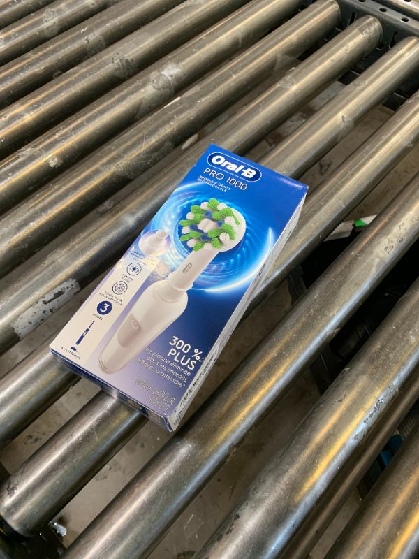 Photo 1 of Oral-B Pro 1000 Rechargeable Electric Toothbrush, White