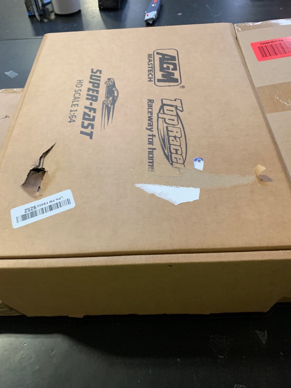 Photo 1 of AGM MASETCH High Speed Series Tram Dual Track Set, Track with 4 Vehicles Official Licensed Slot car Racing, Comes with 2 Hand Controls and Track Parts and a Lap Counter.