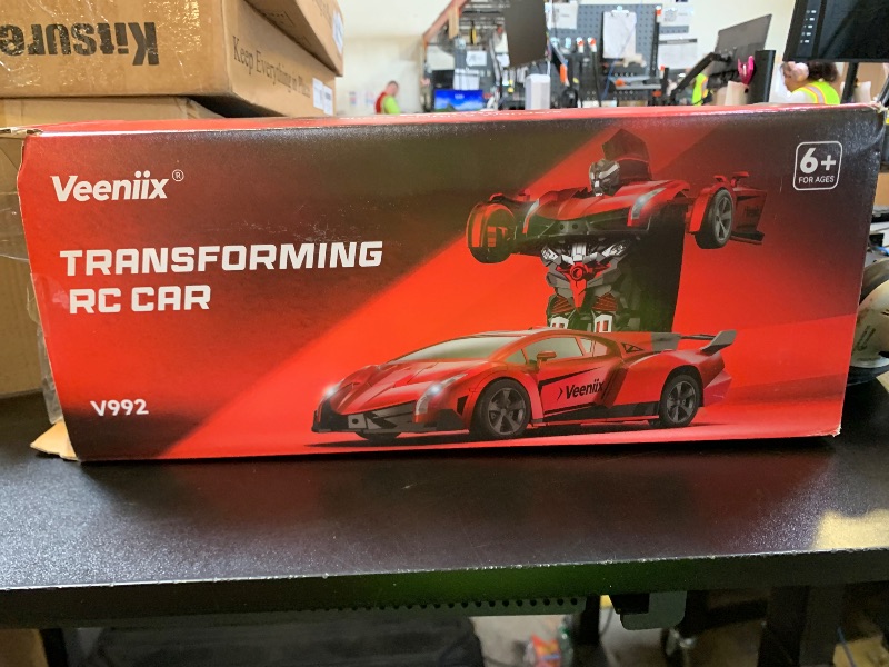 Photo 1 of Veeniix V992 Transform Remote Control Car,Transform Robot RC Cars,1:14 Scale,2-in-1 Robot Toy Car with Sound & Light,Gesture Sensing,Automatic Deformation,Great Gifts Toys for Boys and Girls 4-6 (Red)