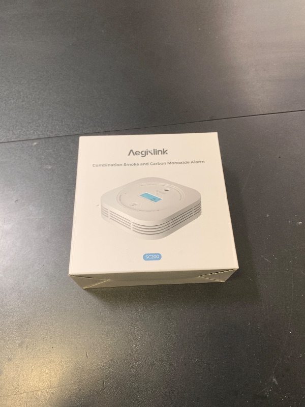 Photo 1 of Aegislink  and Carbon Monoxide Detector 10-Year Lifespan with Replaceable Battery, Photoelectric Fire Alarm and Electrochemical CO Alarm with Test/Silence Button, SC200, 1-Pack