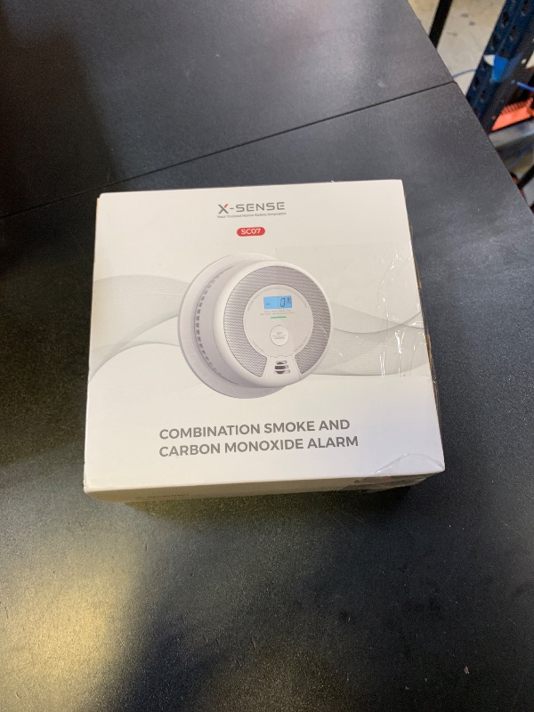 Photo 1 of X-Sense 10-Year Battery Combination Smoke Carbon Monoxide Alarm Detector with Large LCD Display (Standalone Model)
