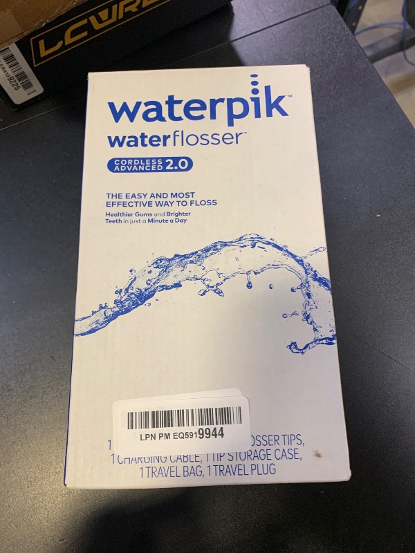 Photo 1 of Waterpik Cordless Advanced 2.0 Water Flosser For Teeth, Gums, Braces, Dental Care With Travel Bag and 4 Tips, ADA Accepted, Rechargeable, Portable, and Waterproof, Black WP-582, Packaging May Vary