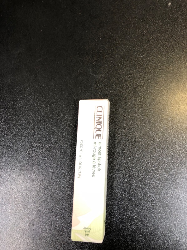 Photo 1 of Clinique Almost Lipstick Tinted Lip Balm in Pink Honey | Sheer + Lightweight
