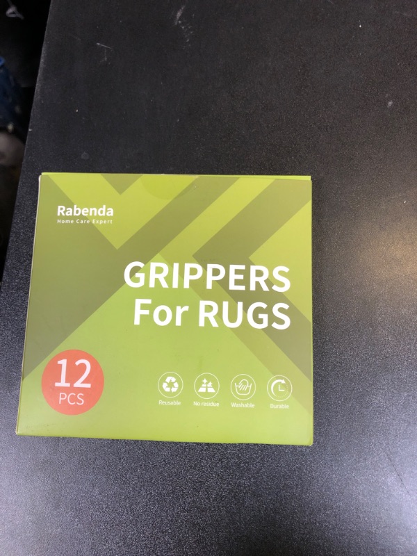 Photo 1 of Rabenda 12 Pcs Rug Tape, Non Slip Rug Pads Grippers for Hardwood Floors and Tiles, Reusable Carpet Tape for Area Rugs, Double-Sided Adhesive Rug Stickers Keep Corners Flat (Black)