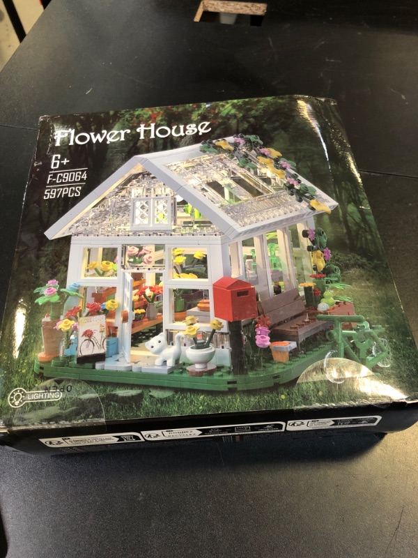 Photo 1 of Flower House Building Set, Creative Garden Playset Toy with LED Light, Build a Greenhouse Model, Great Gift for Friends or Girls (597 Pieces)