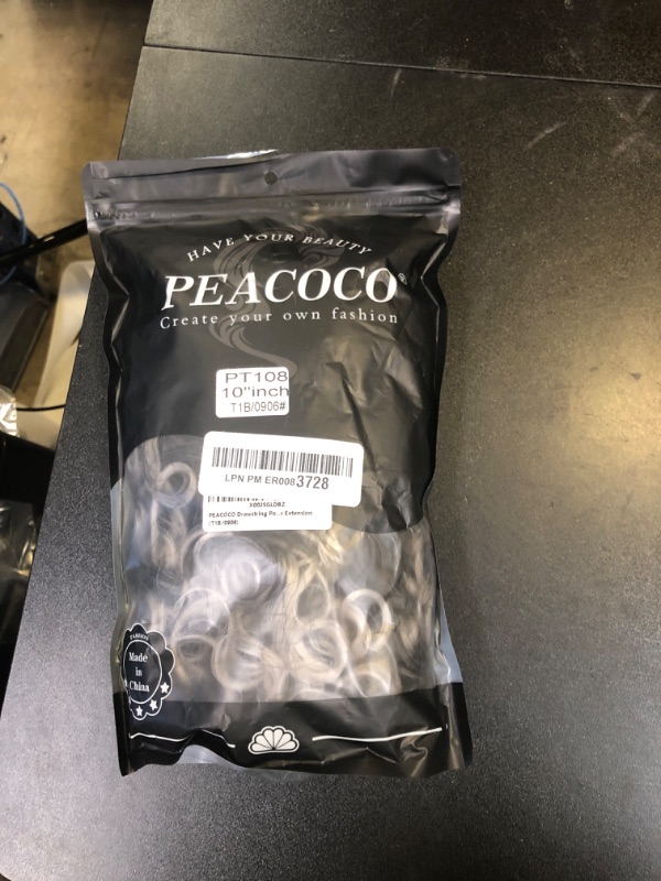 Photo 1 of PEACOCO Curly Ponytail Extension Drawstring Ponytails for Black Women - 10 Inch Pony Tail Clip on Ponytail Synthetic Short Afro Hairpiece for Daily Use?T1B/0906?