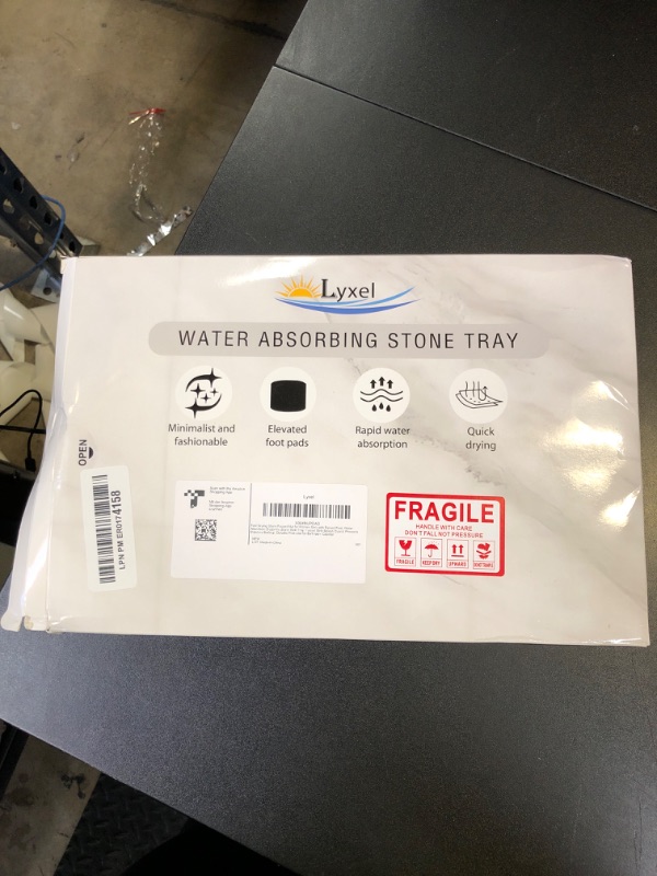 Photo 1 of Faucet Mat for Kitchen Sink with Raised Feet, Stone Sink Mat Quick Dry around Faucet, Water Absorbent Stone Tray, Sink Splash Guard & Protectors, Stone Drying Mat for kitchen Counter