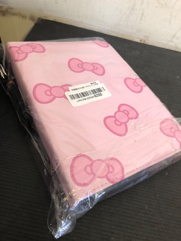 Photo 1 of Pink Card Binder for Girls, 4 Pocket with 50 Sleeves up to 400 Trading Cards Binder, Waterproof Card Storage Bag with Shoulder Strap