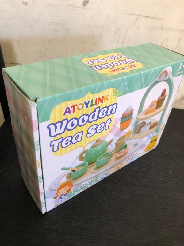 Photo 1 of Atoylink Wooden Tea Party Set for Little Girls 28 Pcs Toddler Tea Set with Cupcake Stand & Food Pretend Play Accessories Kids Kitchen Playset Wooden Toys for 2 3 4 5 6 Year Old Girl Birthday Gift