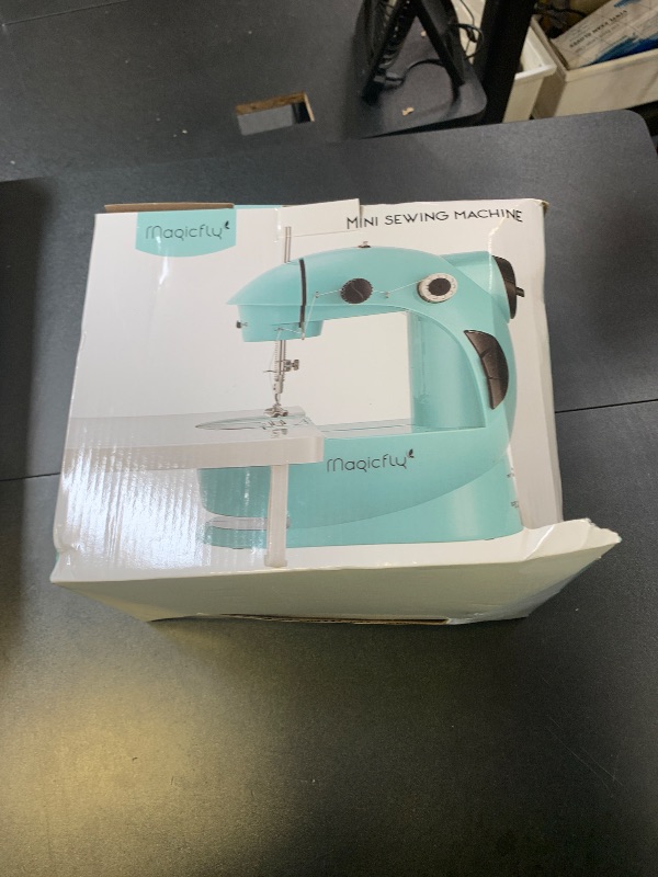 Photo 1 of Magicfly Mini Sewing Machine with Extension Table, Dual Speed Portable Sewing Machine for Beginners with Light, Sewing Kit for Household Use, Blue