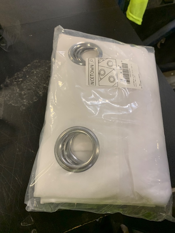 Photo 1 of NICETOWN White Sheer Curtains 84 inches Long - Home Decoration Grommet Airy & Lightweight Elegant Window Treatments with Light Filtering for Bedroom/Living Room (2 Panels, W54 x L84)
