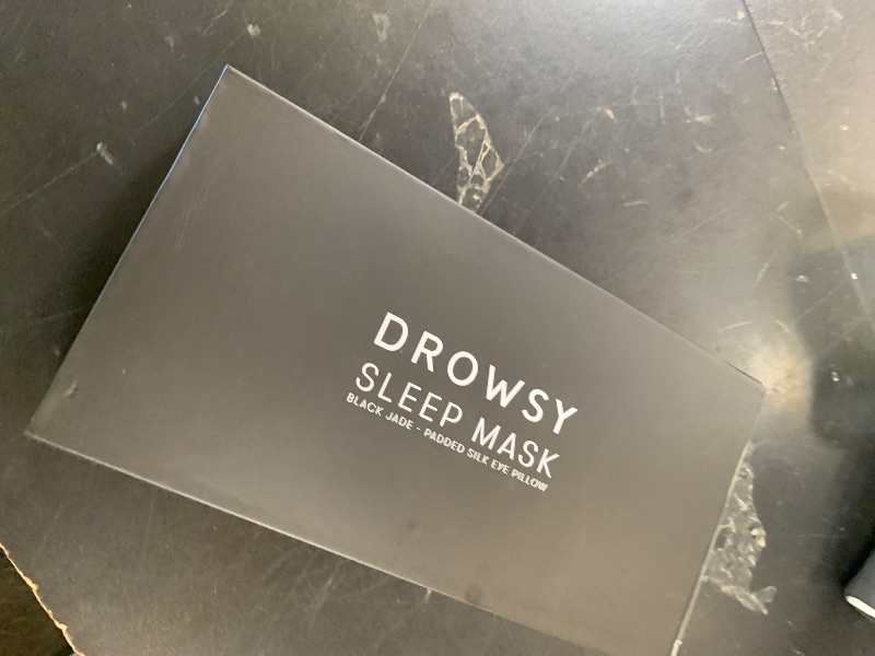 Photo 1 of DROWSY Silk Sleep Mask. Face-Hugging, Padded Silk Cocoon for Luxury Sleep in Total Darkness. (Black Jade)