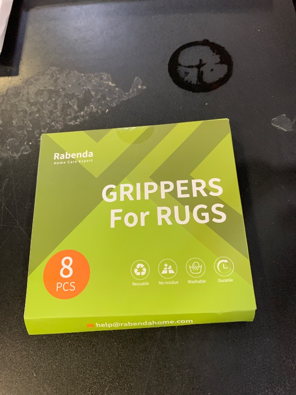 Photo 1 of Rabenda 8 Pcs Grippers for Rugs, Non Slip Rug Pads for Hardwood Floors and Tiles, Reusable Rug Tape for Area Rugs, Dual Sided Adhesive Rug Pad Gripper Keep Corners Flat(Black)