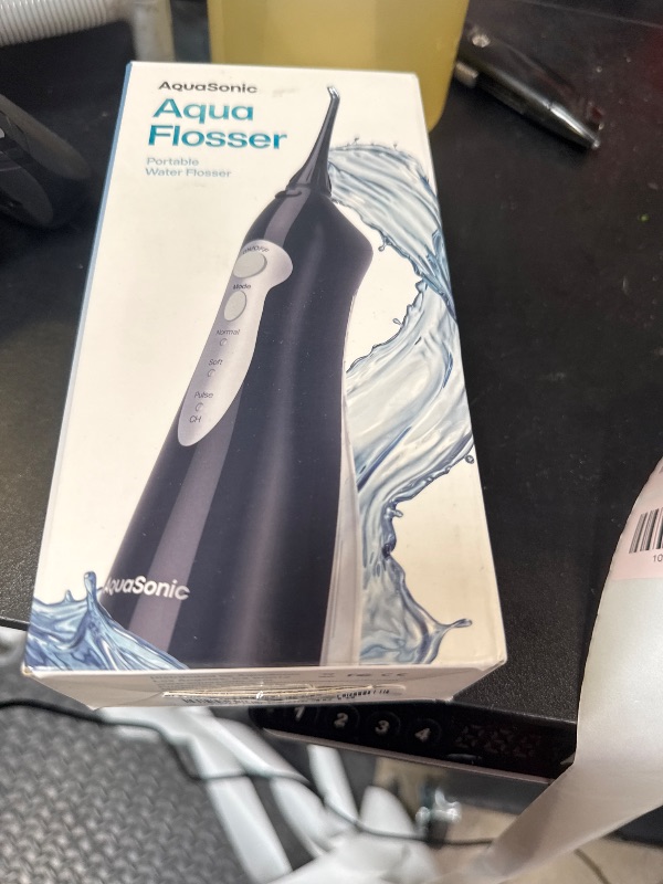 Photo 1 of AquaSonic Aqua Flosser - Cordless Rechargeable Water Flosser for Teeth - Waterproof, Portable Oral Irrigator for Dental Cleaning with 5 Jet Tips – Braces Home Travel