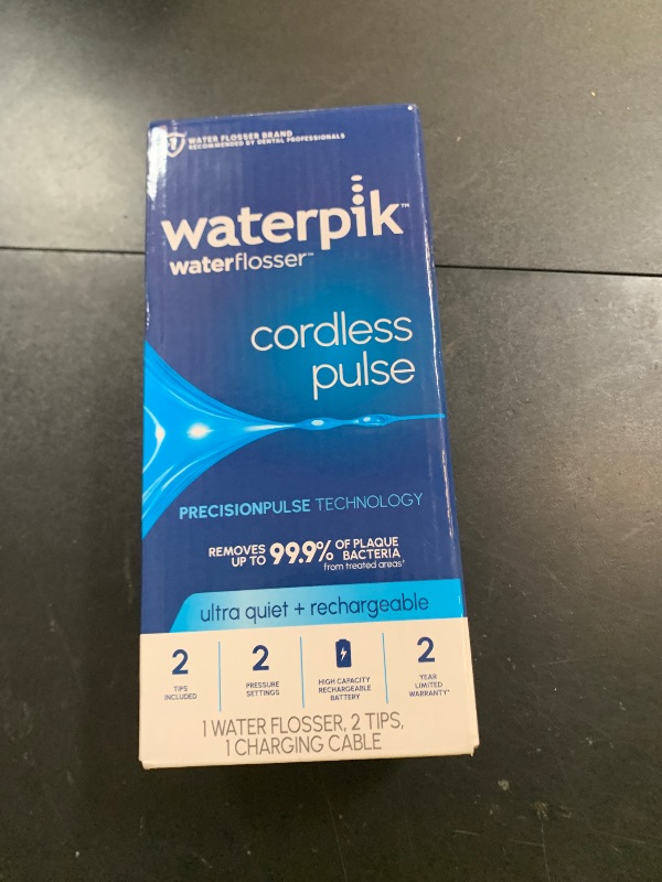 Photo 1 of Waterpik Cordless Pulse Rechargeable Portable Water Flosser for Teeth, Gums, Braces Care and Travel with 2 Flossing Tips, Waterproof, ADA Accepted, WF-20 White, Packaging May Vary