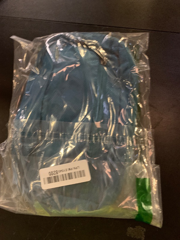 Photo 1 of Travelon: World Travel Essentials Convertible Sling/Waist Pack - Peacock Teal