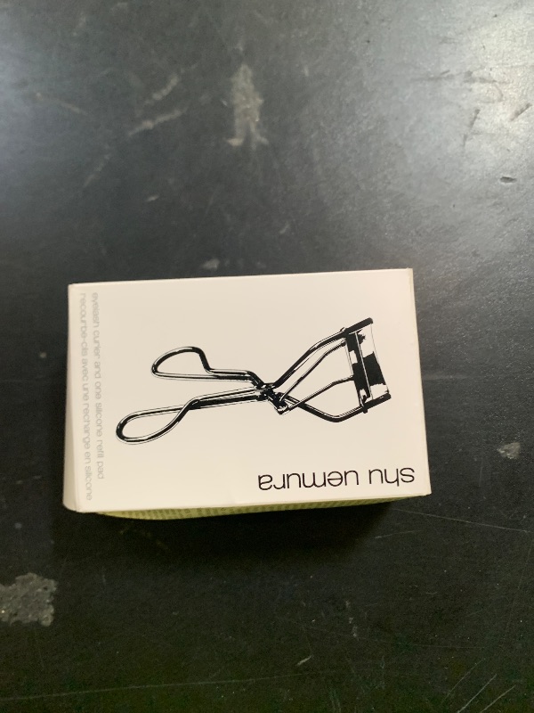 Photo 1 of Shu Uemura Iconic Eyelash Curler, Achieve Precise Control and Long-Lasting Curl - Includes Silicone Replacement Pad