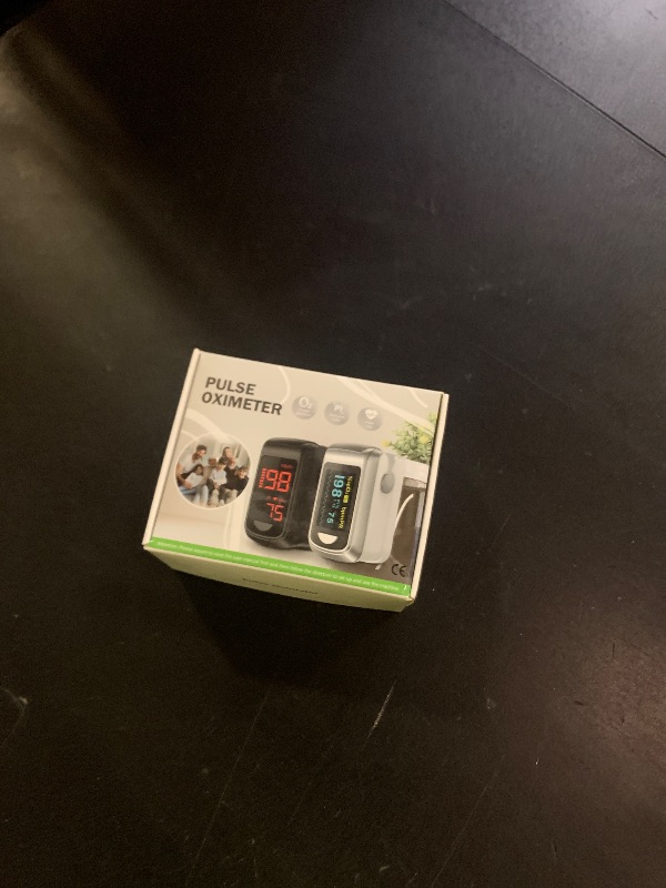Photo 1 of Pulse Oximeter Fingertip- Mini Oximeter Oxygen Saturation Monitor for SpO2/Heart Rate/PI, with Auto Graph Display