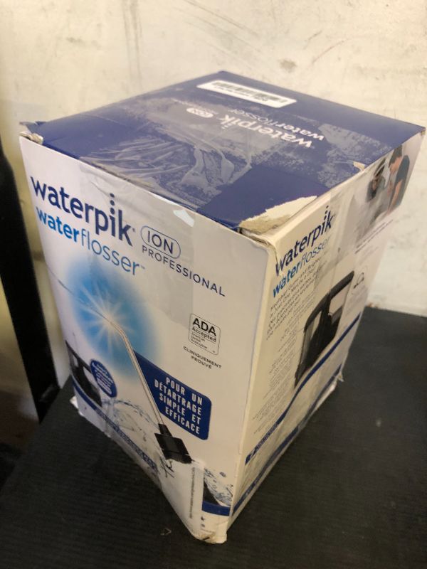 Photo 1 of Waterpik ION Professional Water Flosser, Rechargeable and Portable for Teeth, Gums, Braces, 10 Settings, 7 Flossing Tips For Multiple Users And Needs, ADA Accepted, WF-12 Black, Packaging May Vary