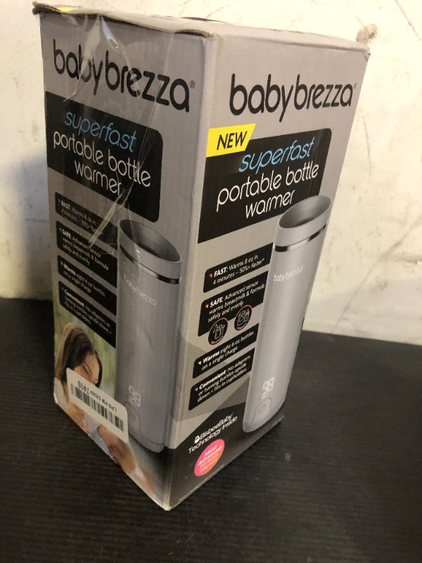 Photo 1 of Baby Brezza SuperFast Portable Baby Bottle Warmer – 67% Faster - Travel Breastmilk Warmer and Formula Warmer - Safe, Even Heating - Up to 9oz - No Adapters, Grey
