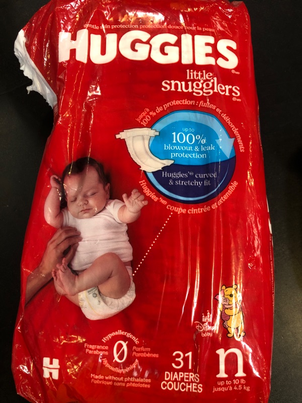 Photo 1 of Huggies Size Newborn Diapers, Little Snugglers Baby Diapers, Size Newborn (up to 10 lbs), 31 Count, Packaging May Vary