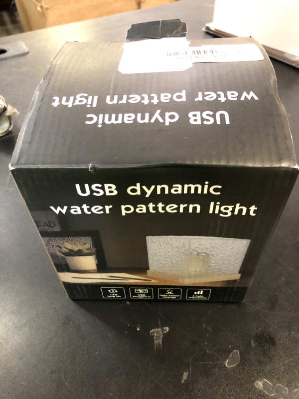 Photo 1 of RICHMYC Ocean Wave Projector Light, 16 Colors Gradual Rotating Water Lamp with Remote Control, Beach Decor Sea Themed Northern Lights Projector for Office Bedroom Bar Restaurant