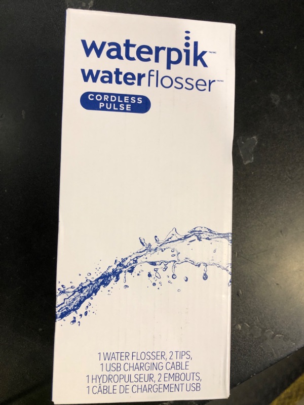 Photo 1 of Waterpik Cordless Pulse Rechargeable Portable Water Flosser for Teeth, Gums, Braces Care and Travel with 2 Flossing Tips, Waterproof, ADA Accepted, WF-20 White, Packaging May Vary