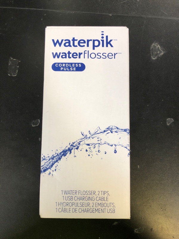 Photo 1 of Waterpik Cordless Pulse Rechargeable Portable Water Flosser for Teeth, Gums, Braces Care and Travel with 2 Flossing Tips, Waterproof, ADA Accepted, WF-20 White, Packaging May Vary