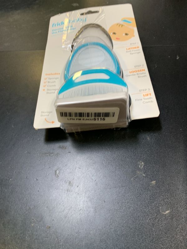 Photo 1 of Frida Baby The 3-Step Cradle Cap System, DermaFrida The FlakeFixer, Sponge, Brush, Comb and Storage Stand for Babies with Cradle Cap, White-Blue