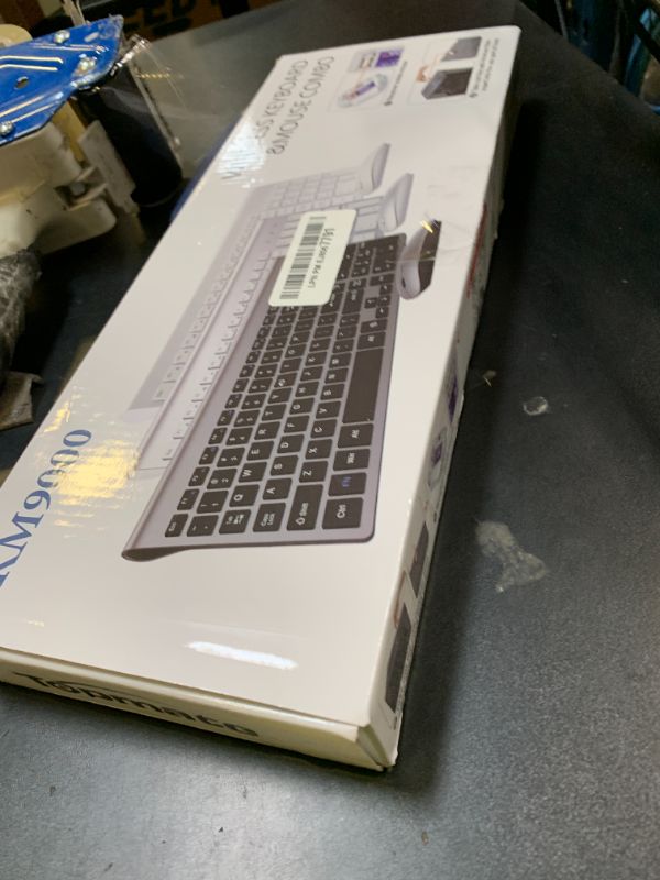 Photo 1 of Wireless Keyboard and Mouse Ultra Slim Combo, TopMate 2.4G Silent Compact USB 2400DPI Mouse and Scissor Switch Keyboard Set with Cover, 2 AA and 2 AAA Batteries, for PC/Laptop/Windows/Mac-Silver White