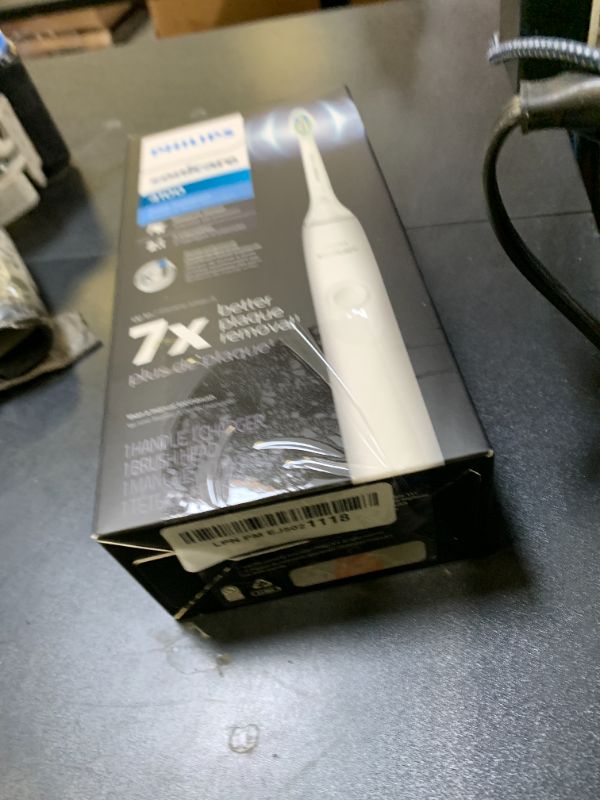 Photo 1 of Philips Sonicare 4100 Rechargeable Electric Toothbrush, with Pressure Sensor, 2 Intensity Settings, SmarTimer and QuadPacer, 14-Day Battery Life, White, Model HX3681/23