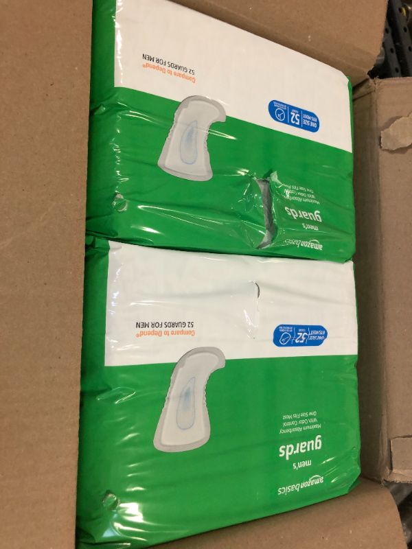Photo 1 of Amazon Basics Men's Incontinence Guards, Maximum Absorbency, 104 Count, (2 Packs of 52)