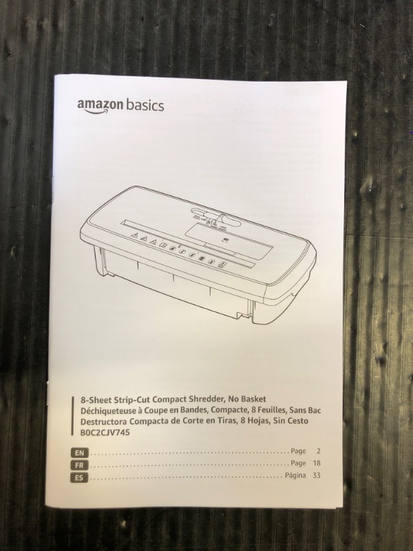 Photo 1 of Amazon Basics 8-Sheet Strip Cut Paper, CD, and Credit Card Shredder with Auto-Off Compact, Portable Design, No Basket, Extendable Arm, Black