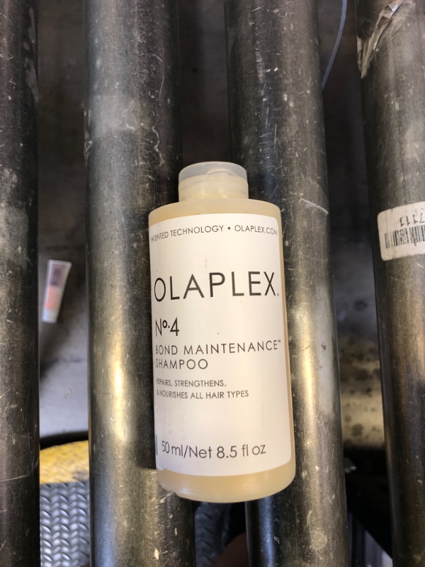 Photo 1 of Olaplex No. 4 Bond Maintenance Shampoo, Repairs, Strengthens, & Nourishes All Hair Types, Adds Shine & Leaves Hair Feeling Soft, 8.5 fl oz