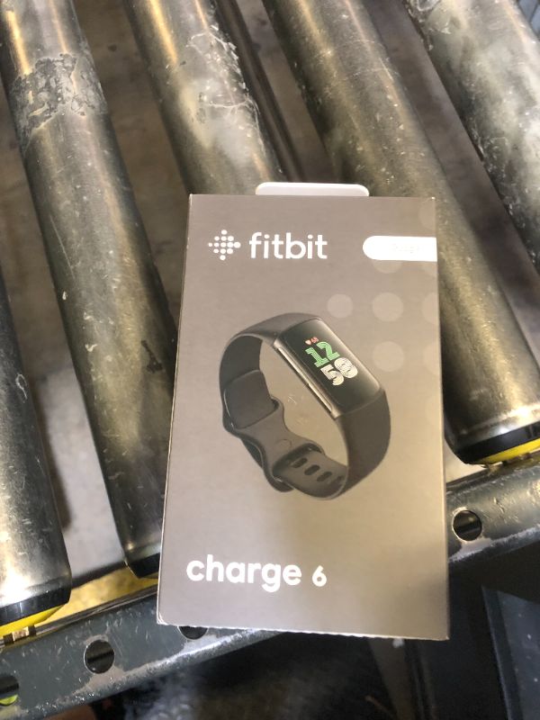 Photo 1 of Fitbit Charge 6 Fitness Tracker with Google apps, Heart Rate on Exercise Equipment, 6-Months Premium Membership Included, GPS, Health Tools and More, Obsidian/Black, One Size (S & L Bands Included)