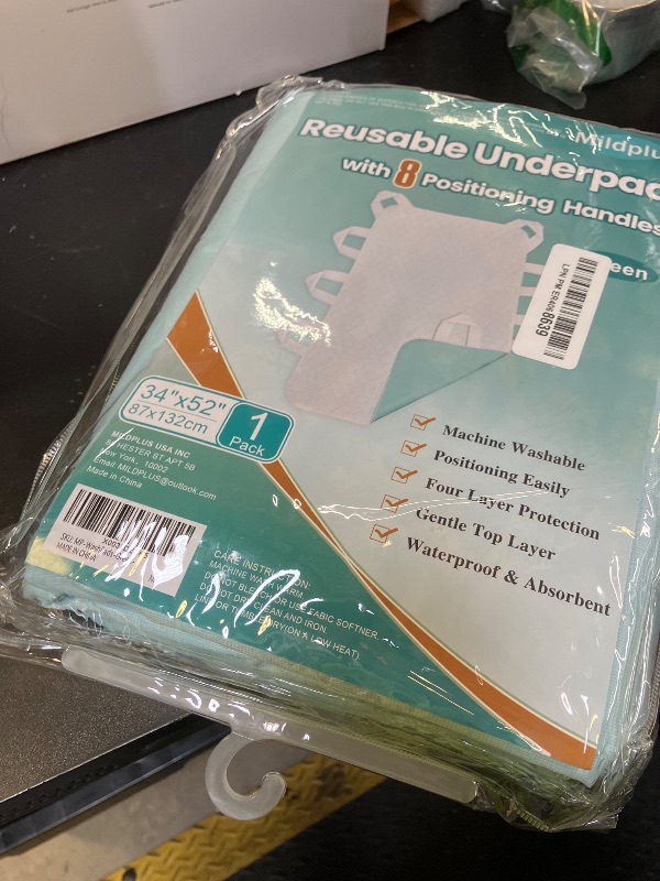 Photo 1 of MILDPLUS Washable Bed Pads with 8 Sturdy Handles 34”×52” Extra Large Reusable Underpads 4-Layers Leakproof Chucks Pads Washable for Incontinence (1 Pack; Green)