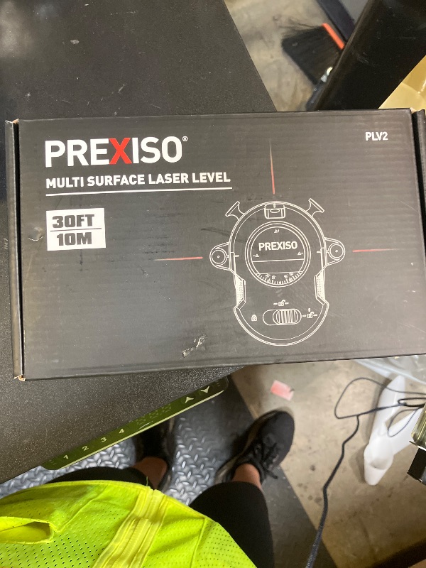 Photo 1 of PREXISO Multi Surface Laser Level LED Light Vial, 30Ft Horizontal & Vertical Line Laser with Wall Mount Base, 2 Pins, 10 Sticker, 2 AA Batteries for Hanging Frames & Picture, Construction Wall Writing