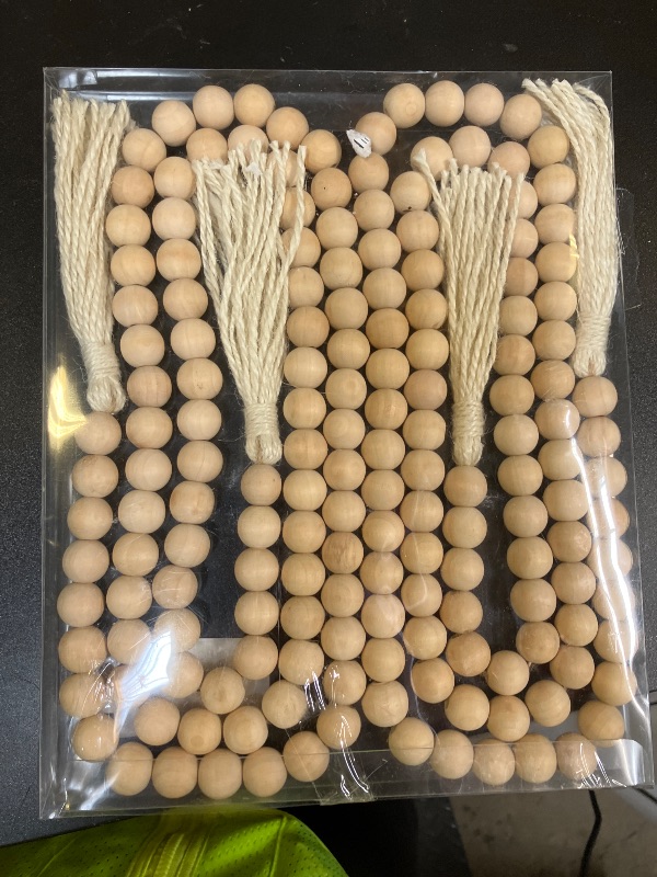 Photo 1 of DECORKEY Farmhouse Wood Beads Garland, 2 Pack 58 Inch Wooden Beads for Boho Home Decor with Tassels, Rustic Country Decor for Coffee Table, Wall, Shelf, Tray, Vase, Living Room, Bedroom