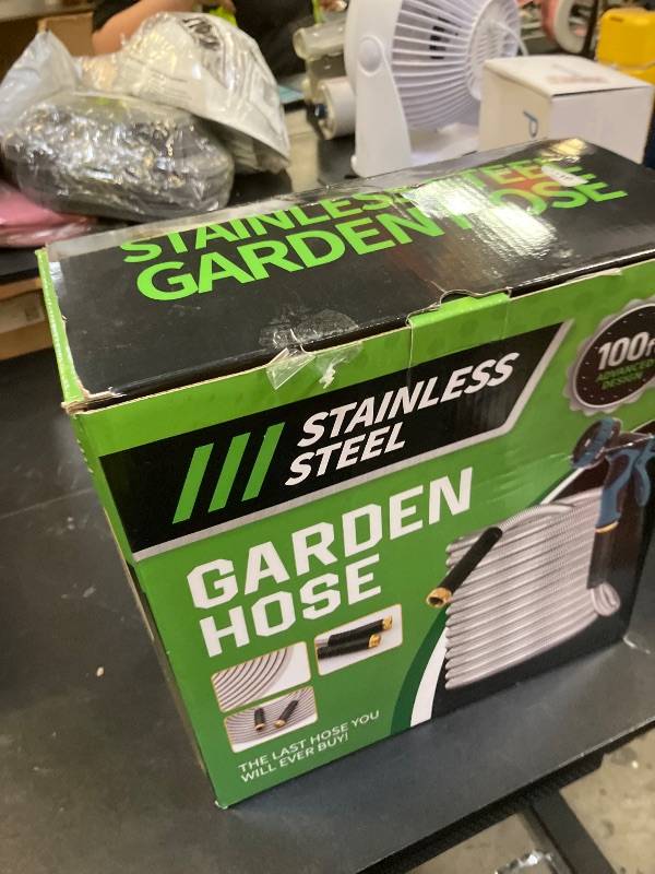 Photo 1 of Advinski Garden Hose 100FT, Water Hose with 10 Function Nozzle, Garden Hose Metal with Leak-proof Connectors, No-Kink, Lightweight, Puncture-proof, Pet-proof, Sturdy, 550PSI, Hose for Outdoor, Yard