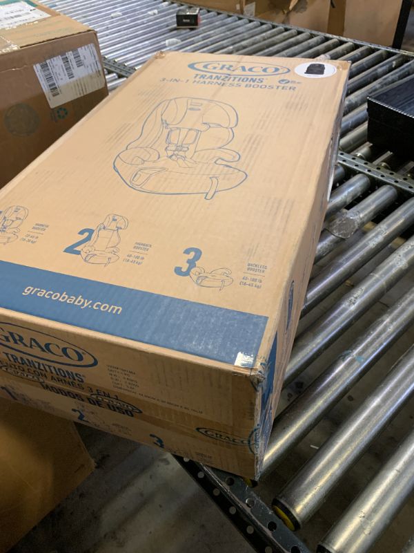 Photo 1 of Graco Tranzitions 3-in-1 Harness Booster Car Seat, Forward Facing Car Seat, Highback, to Backless Booster, Black