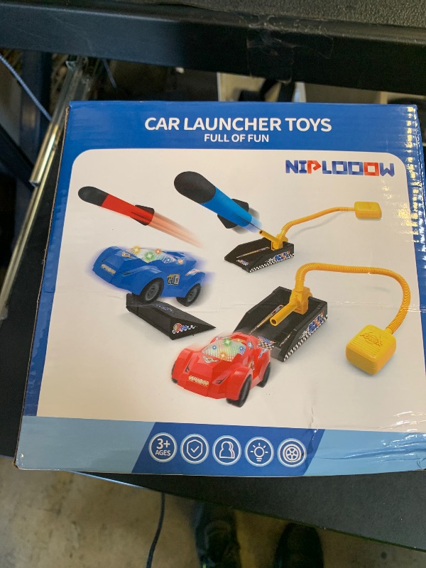 Photo 1 of NIPLOOOW Rocket Toy Car Launcher, 2 Race Car and 6 Foam Rockets, Outdoor Outside Backyard Toys for Boys & Girls, Birthday Gift Toys for Kids Boys Girls Age 3 4 5 6 7 8 Years Old